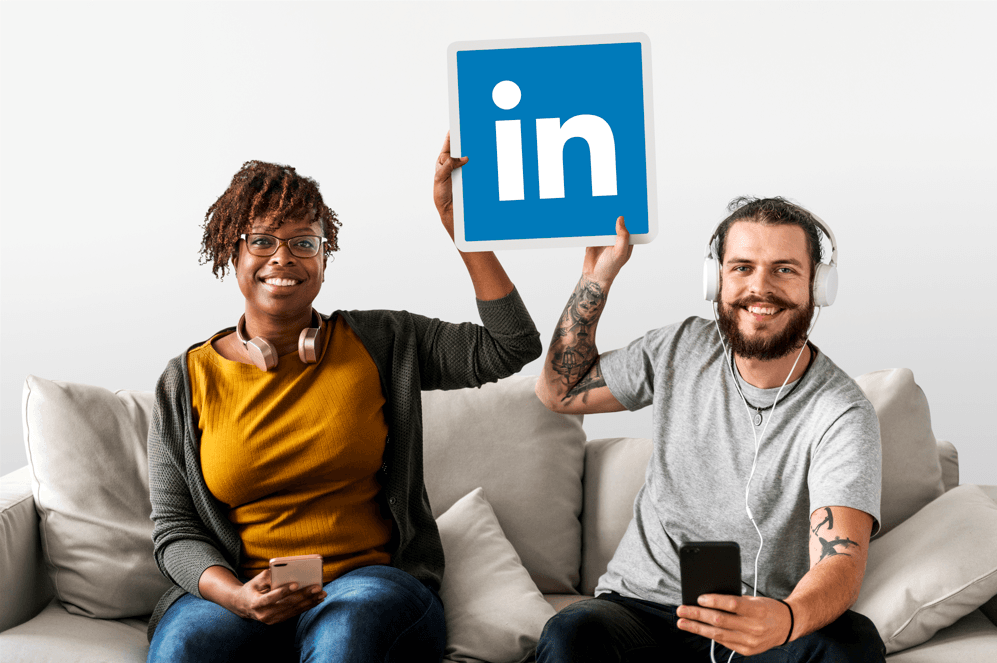 People holding a LinkedIn logo